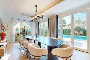 Dubai dining area with pool view, professionally photographed by an interior photographer. Explore stunning interior designs and scenic poolside views in our portfolio.